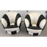 2 matching black and white retro style swivel tub chairs by The Premier Company Ltd.