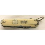 A vintage pocketknife/multi tool by Asprey of London.