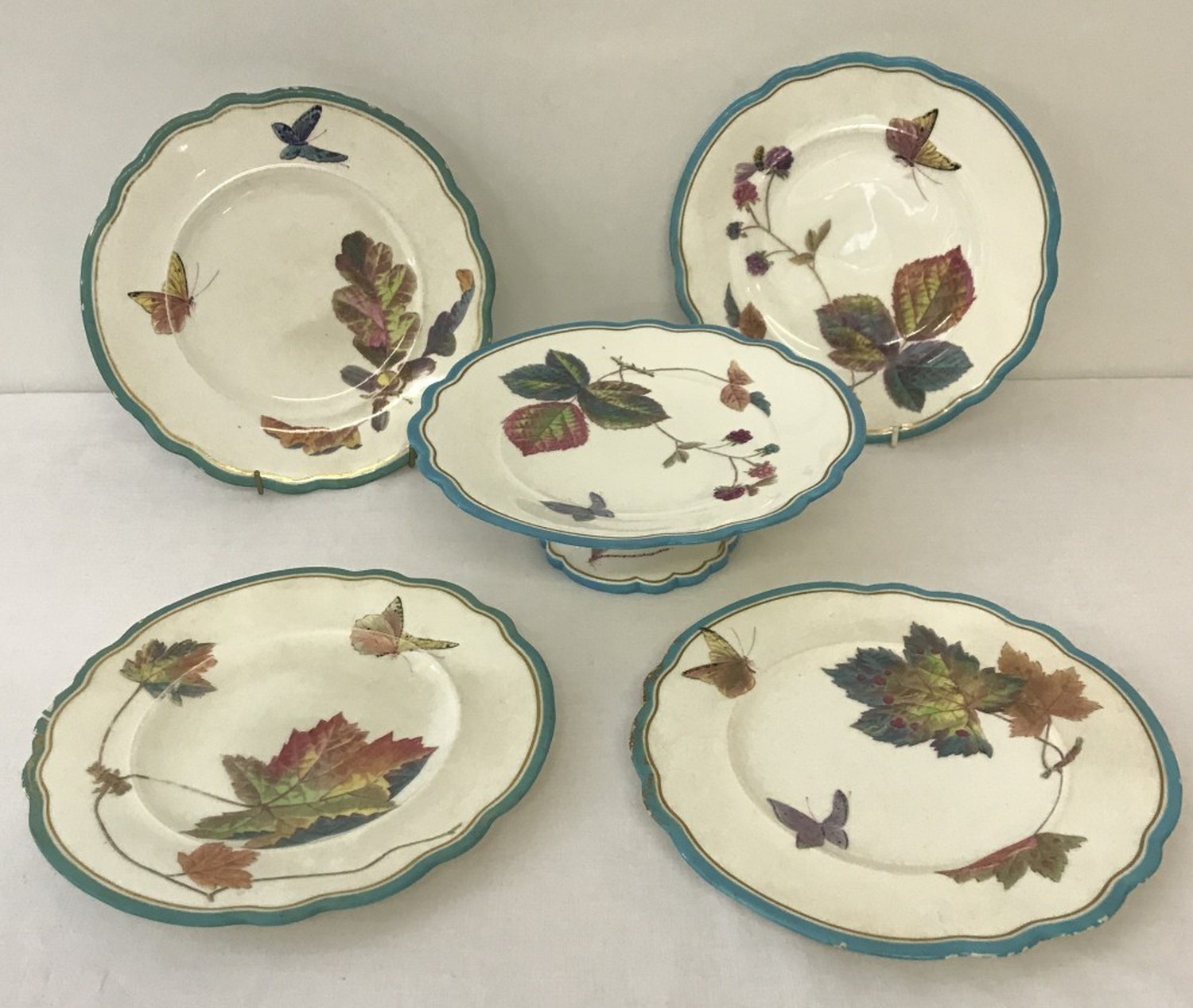 A Victorian Powell & Bishop "Trentham" pattern footed cake stand together with 4 matching plates.