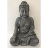 A large garden ornament of seated Buddha, possibly fibre glass.