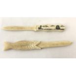 2 decorative bone letter openers.