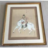 A large signed Japanese print of a horseman.