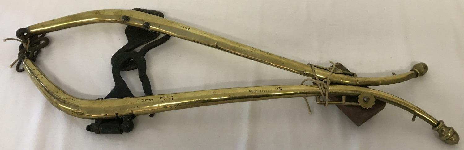 A pair of vintage brass hames. Marked "Double cased, solid brass, No 3".