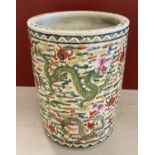 A large Chinese hand painted ceramic pot/planter, with dragon detail.