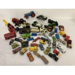 A collection of mixed diecast toy vehicles to include examples by Ertl, Lone Star and Dinky.