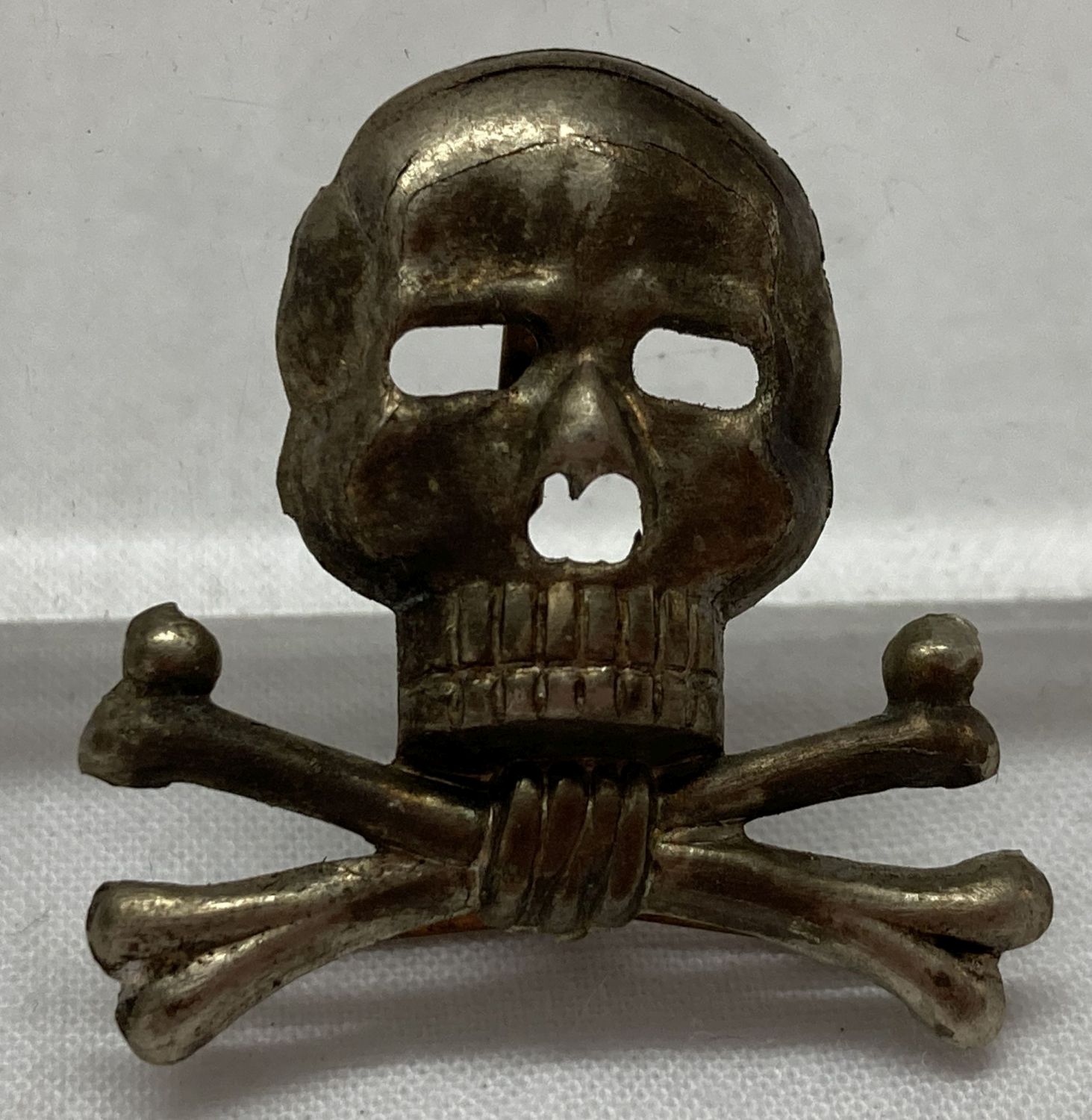 A German WWII style Brunswick Regiment Skull badge.