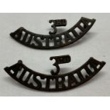 WWI style Third Australian Imperial Force shoulder titles. One has broken lug.