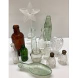 A collection of vintage glassware to include advertising bottles.