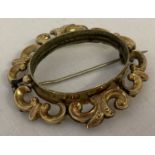 A decorative Victorian gold mourning brooch mount, tests as 9ct gold.