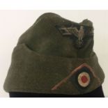 A WWII style German Panzer grenadier's M34 overseas cap. Indistinct mark to inside.