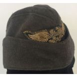 A WWII style Luftschultz side cap.