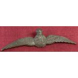 A WWI style R.F.C. Bronze Officer's Pilot's Wings pin back badge.
