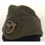 A WWII style 1936 pattern Schutzpolizei side cap.