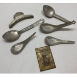 A collection of Vietnam War style Viet Cong items to include spoons & mirror.