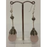A pair of silver and rose quartz drop earrings set with marcasite's.