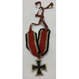 A WWII style tailor's copy Knight's Cross medal with ribbons.