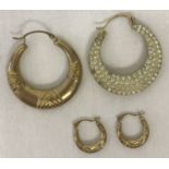 2 pairs of hoops style earrings. A larger pair set with clear stones to one side.