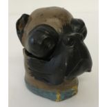 A cold painted, hinge lidded trinket pot in the shape of a Boxer dog head.