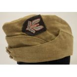 A WWII style British Special Air Service side cap.