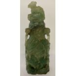 A carved green quartz 2 handled lidded urn with exotic bird detail, front and back.