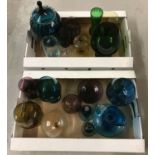 A large collection of vintage coloured glass items.