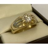 A men's 18ct gold diamond solitaire gypsy style ring. Diamond size approx. .80ct.