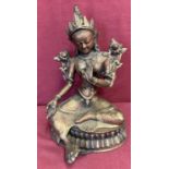 A large Chinese hollow bronze, 2 toned metal work figurine of a Deity.