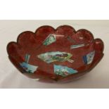 A deep pink cloisonné bowl with scalloped shaped rim and unusual metallic finish.