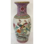 A large Chinese porcelain Famille Rose vase.