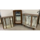 3 vintage and retro glass fronted display cabinets all with interior shelves.