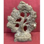 A hollow bronze figurine of a Chinese coin tree.