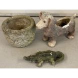 3 Garden ornaments. A concrete garden planter pot with fauna and bird decoration.