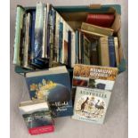 A box of vintage books relating to foreign countries and travel, primarily Australia.