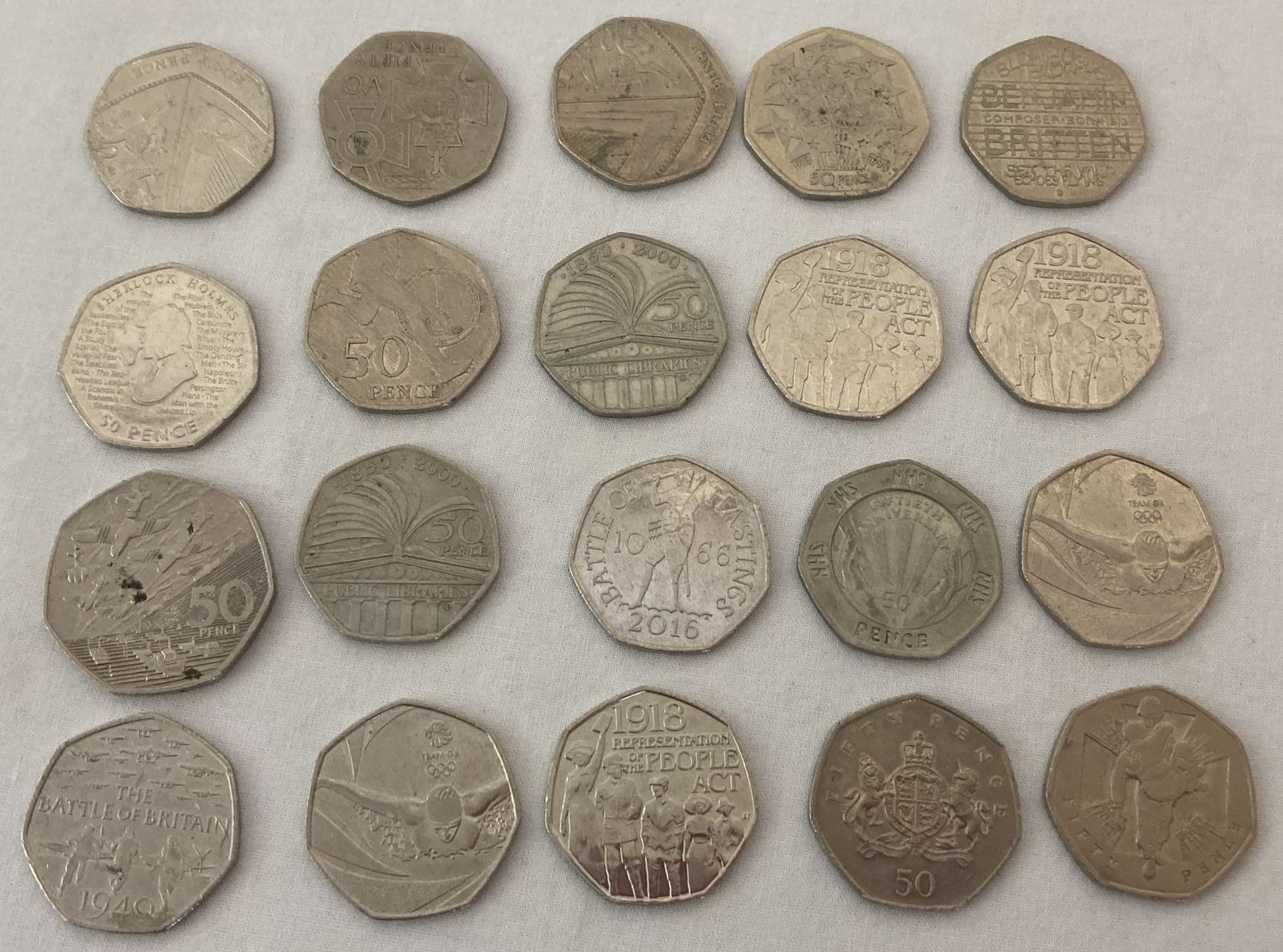 20 collectable commemorative 50p coins dating from 1994 -2019.