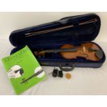 A cased Cathedral VS-00 4/4 wooden bodied children's violin.