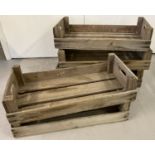 5 vintage wooden crates/trays. 3 with "Westdock Limited" printed to ends.
