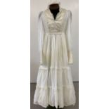 A vintage 1970's Liberty of London organdy and raw silk wedding dress by Liz Williams.