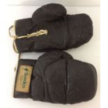 A pair of Sondico brown leather boxing gloves.