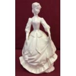 A Royal Worcester figurine entitled "Charity", in blanc de chine finish, dated 1978.