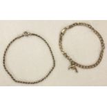 2 silver bracelets. A rope chain bracelet with spring clasp.