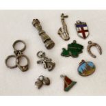 10 vintage silver and white charms.