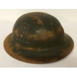 A WWI British rimless Brodie helmet with hand painted insignia of 24th Division 12th Field Ambulance