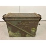 A green painted military metal ammunition box.