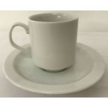 A German WWII style Waffen SS white ceramic cup and saucer.