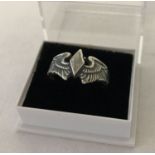 A WWII style US Woman's Airforce Service Pilots (W.A.S.P) white metal ring.