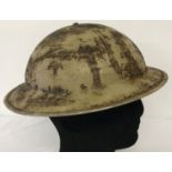 A WWII South African Brodie helmet and liner.