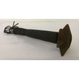 A WWI style wooden handled trench raiding club with leather strap.