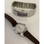 2 ladies wristwatches. A modern DKNY with stainless steel bracelet.