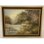 A signed, gilt framed oil on canvas of a boy fishing, by Les Parsons.