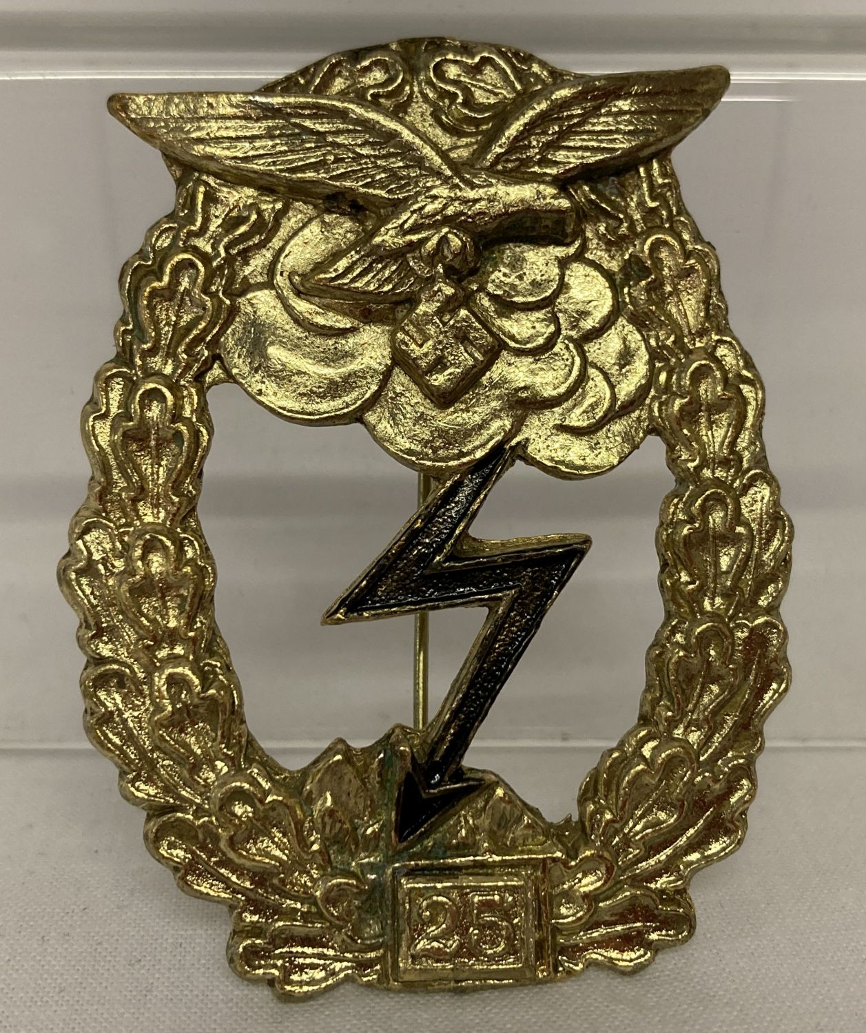 A WWII style German Luftwaffe 25 assults badge.